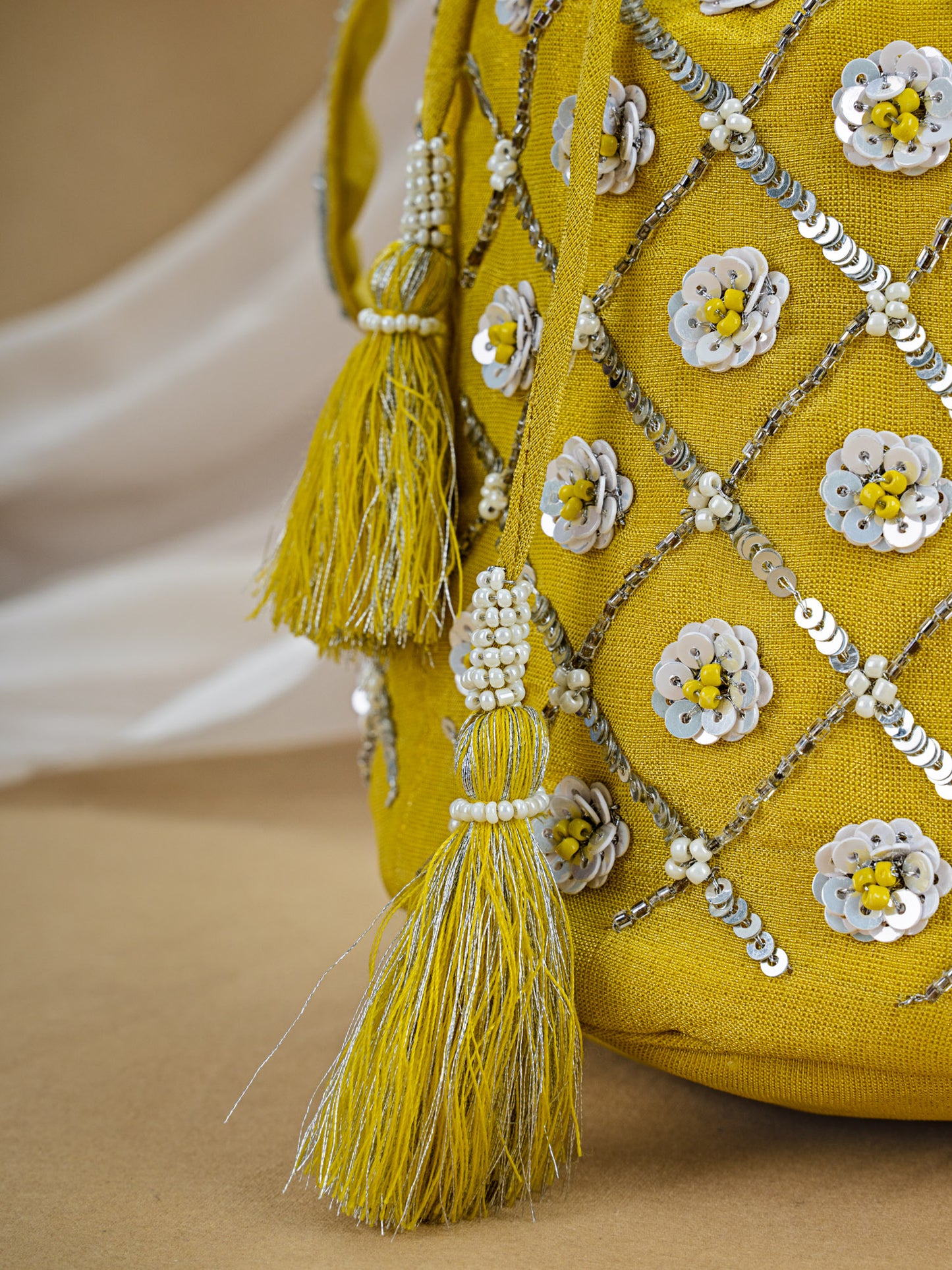 Yellow Tissue Potli with Hand Embroidery