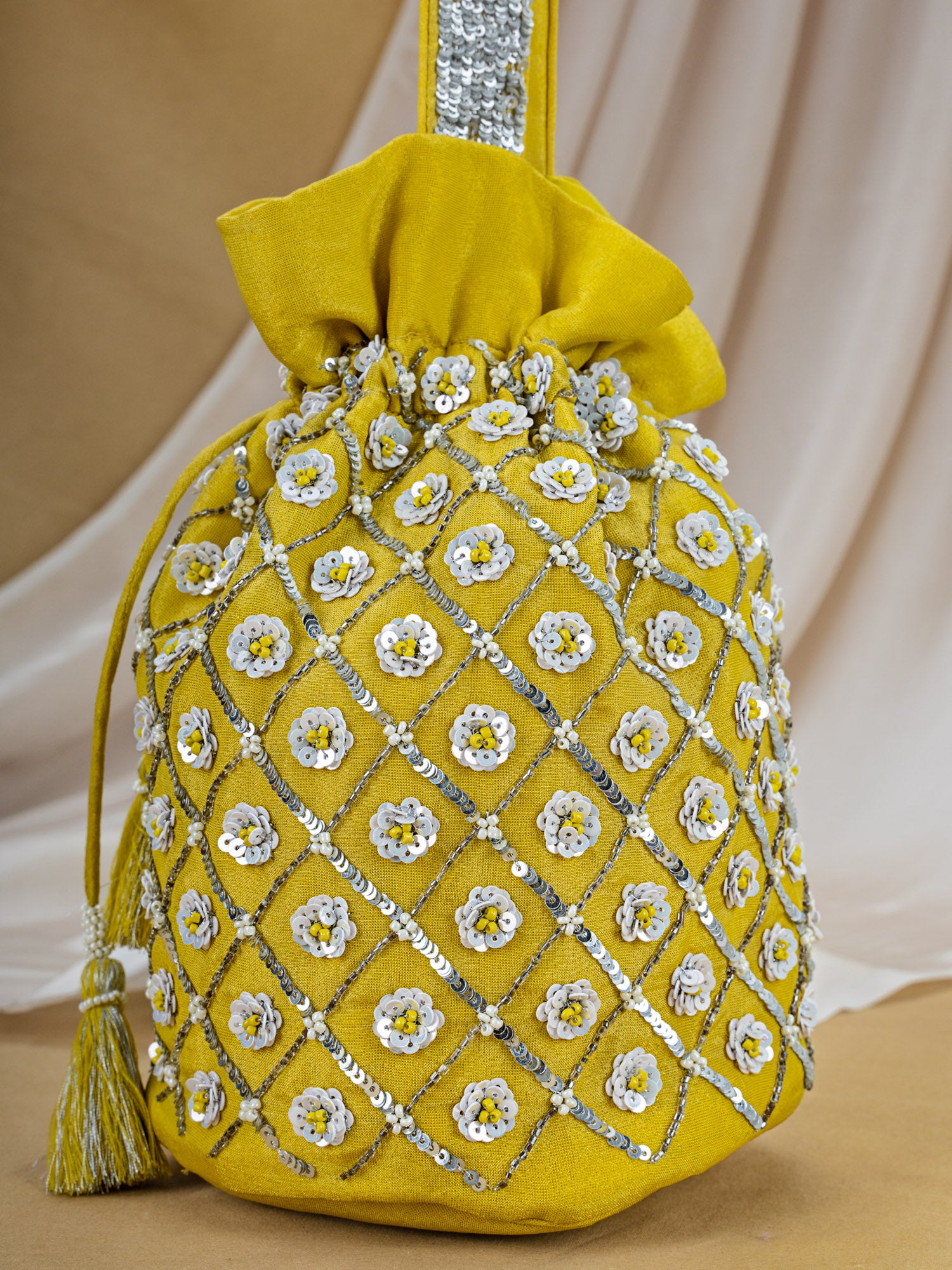 Yellow Tissue Potli with Hand Embroidery
