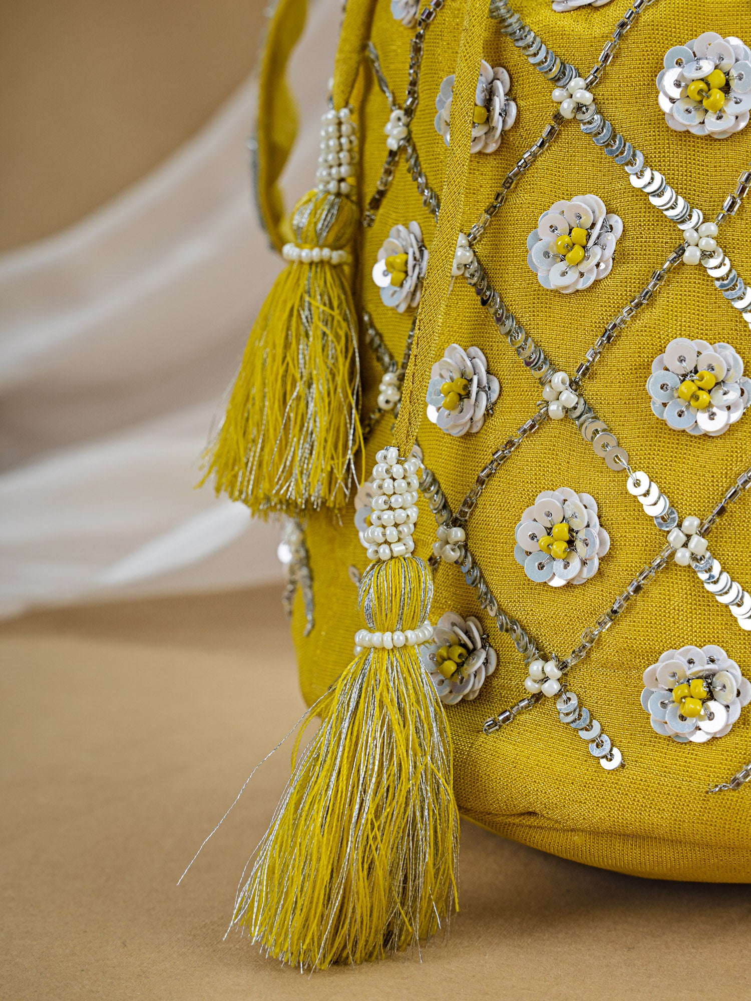 Yellow Tissue Potli with Hand Embroidery