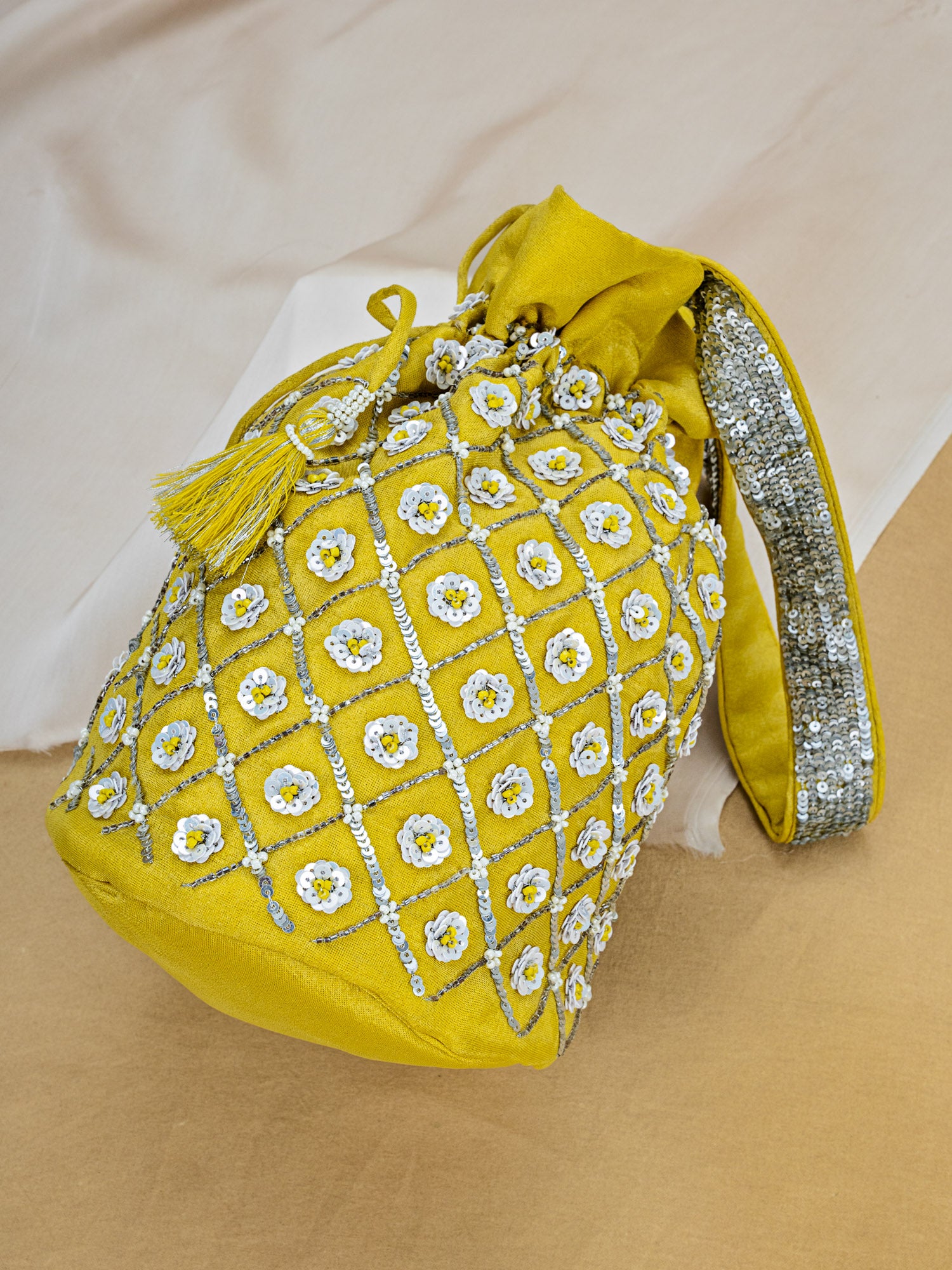 Yellow Tissue Potli with Hand Embroidery
